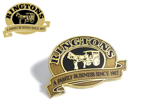 Metallic gold coloured enamel badges to give a traditional look.