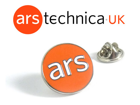 ARS custom corporate enamel pin badges made with orange and white enamel.