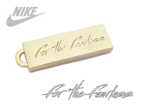 Reverse of Nike FC pendant